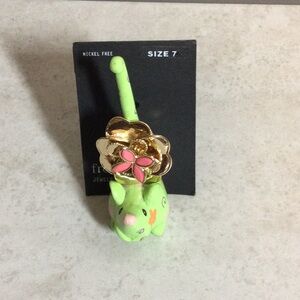 NWT free press size 7 gold with pink flower ring
